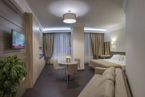 Отели . Гостиница Апартаменты 4-местный студио. 