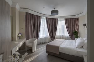 Отели . Гостиница Апартаменты 4-местный делюкс. 