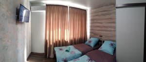 Hotels . Hotel Apartament Quadruple overlooking the garden. 