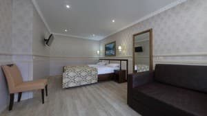 Отели . Гостиница Люкс 4-местный + 2 доп. места. 