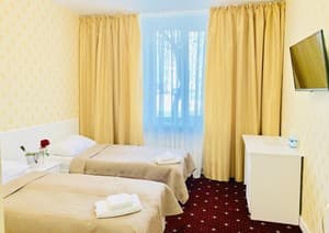 Готелі . Готель Покращений двомісний з 2 односпальними ліжками. 