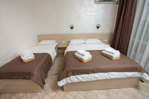 Отели . Гостиница Трехместный стандарт улучшеный с видом на бассейн. 