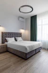 Отели . Гостиница Апартаменты двухместный DeLuxe Silver Style с барной стойкой. 