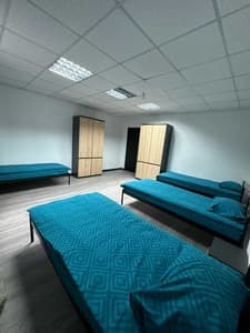 Hotels . Hotel Bed in Mixed Dormitory quadruple room Bathroom on the floor. 