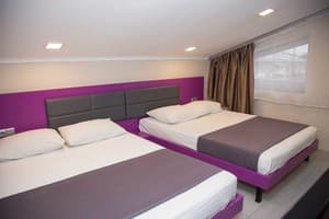 Отели . Гостиница Апартаменты 4-местный двухуровневые. 