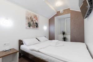 Отели . Гостиница Семейный 4-местный Делюкс. 