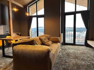 Отели . Гостиница Апартаменты двухместный Однокомнатные в мансарде с видом на панораму гор. 