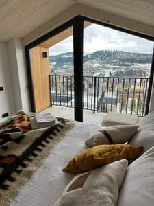 Отели . Гостиница Апартаменты двухместный с видом на панораму гор. 