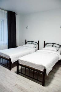 Отели . Гостиница Стандарт двухместный с раздельными кроватями и видом на горы. 