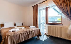 Готелі . Готель Сімейний тримісний люкс з балконом (3+1). 