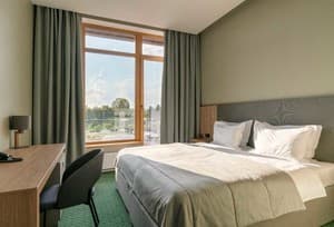 Готелі . Готель Покращений двомісний STANDARD POOL VIEW. 