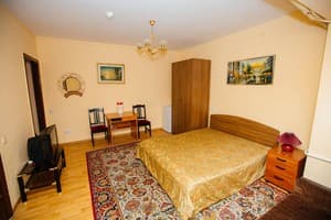 Uyut. Room Comfort Double Twin with double bed an sofa